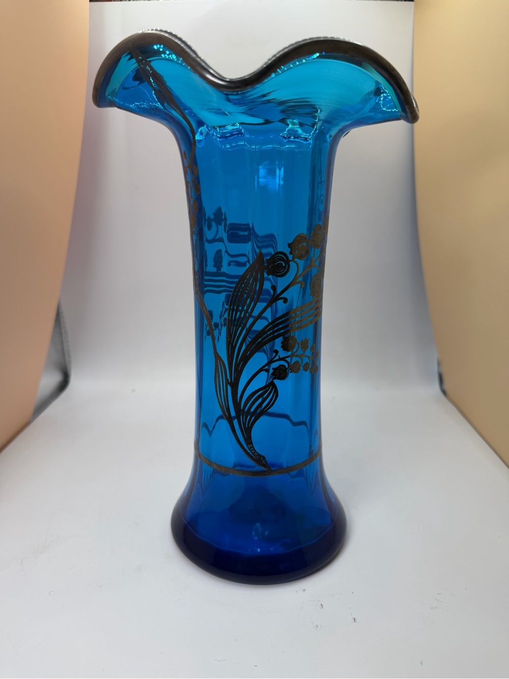 Blue Glass Ruffled Edge Decorative Vase with Sterling Silver Floral Overlay.